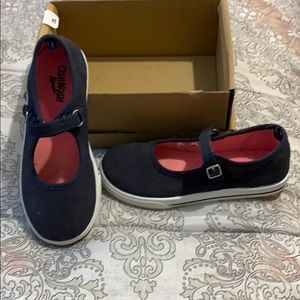 Girls navy blue sneakers w/strap. Lightly worn